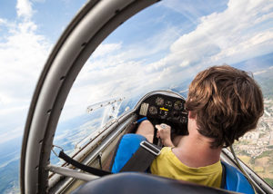 Person flying in a glider