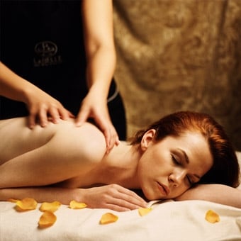 Couple,Massage.,Two,Men,Doing,Back,Massage,To,Two,Women. - Cloud 9 Massage